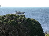 A small island and a fishing boat at Leeman