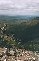 Standing on a rockfall in the second part of the climb